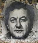 portrait Coluche loading =